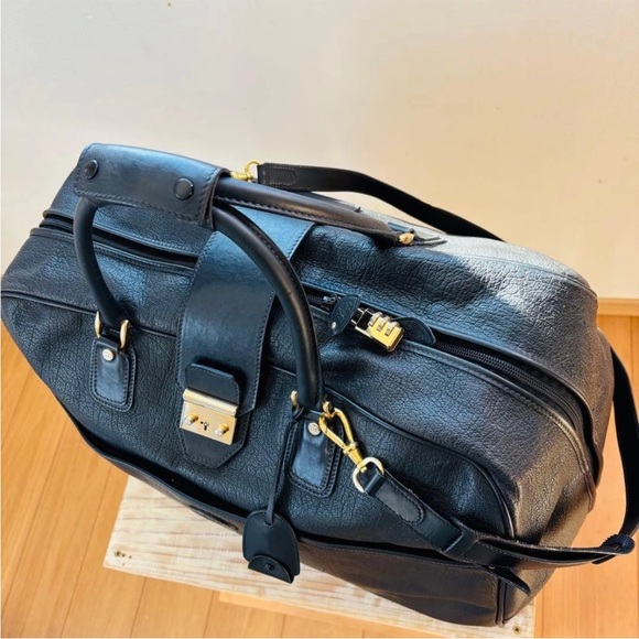 Gucci Black Leather Duffel Bag with Gold Accents - Picture 3 of 16